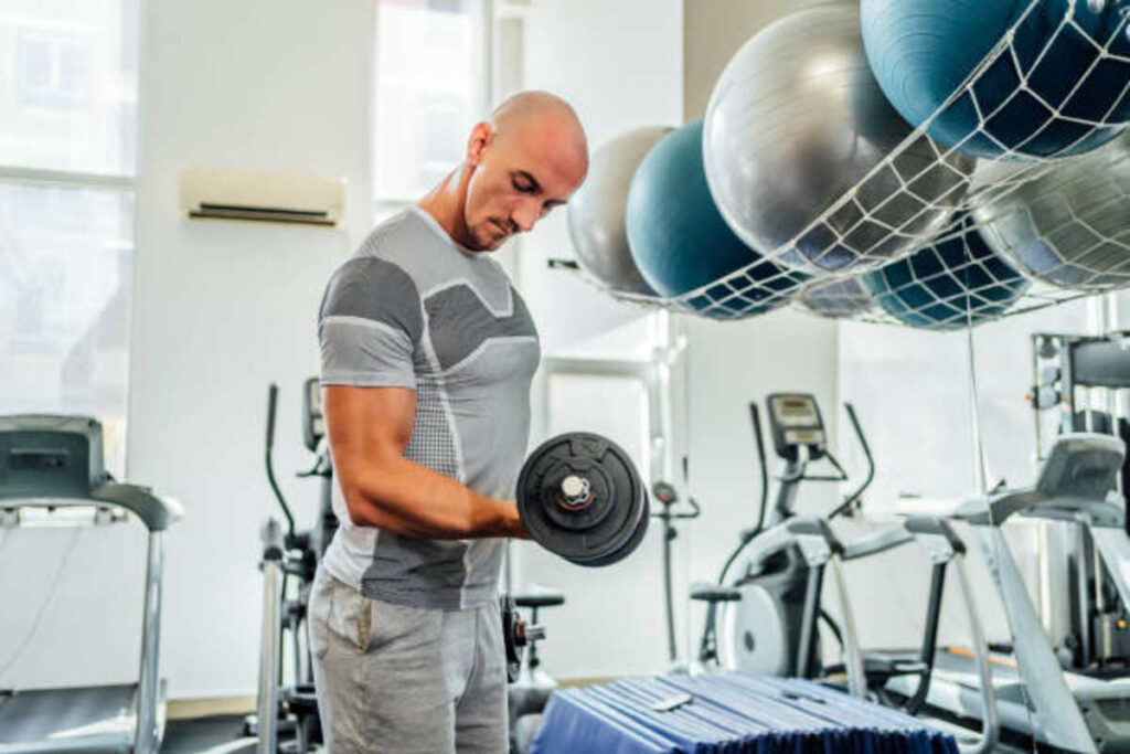 man-exercising-with-dumbbells