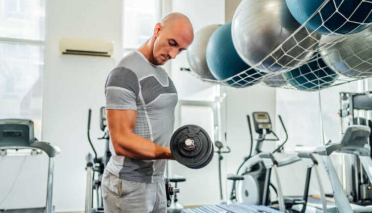 man-exercising-with-dumbbells